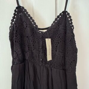 Woman’s size medium black jumpsuit